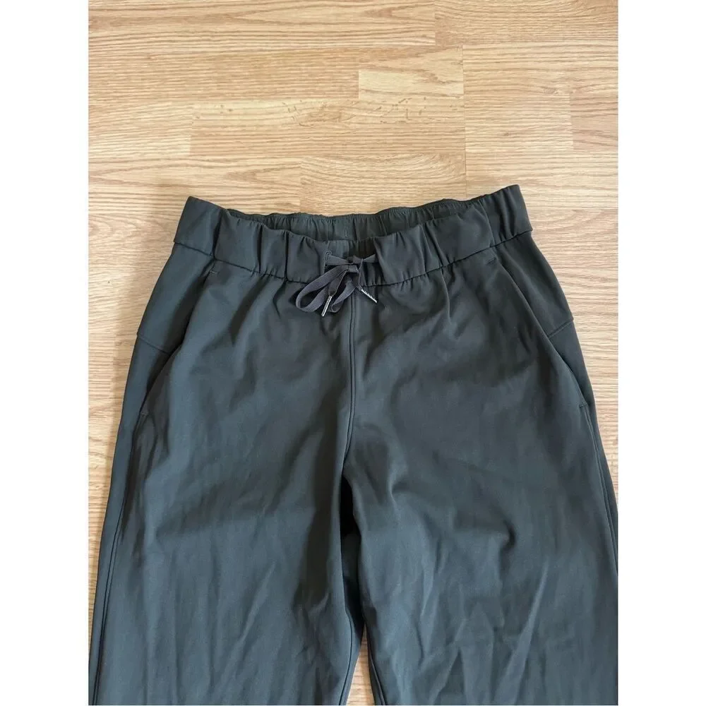 Lululemon Women's On the Fly 7/8 Sophisticated Silhouette Pant Dark Olive Size 6